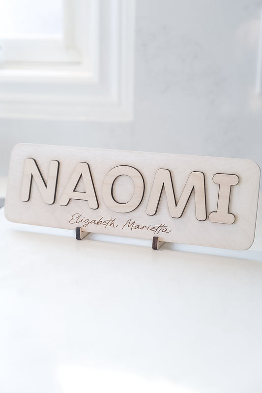 Name Puzzle Sign